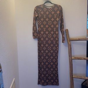 L V  inspired body con dress